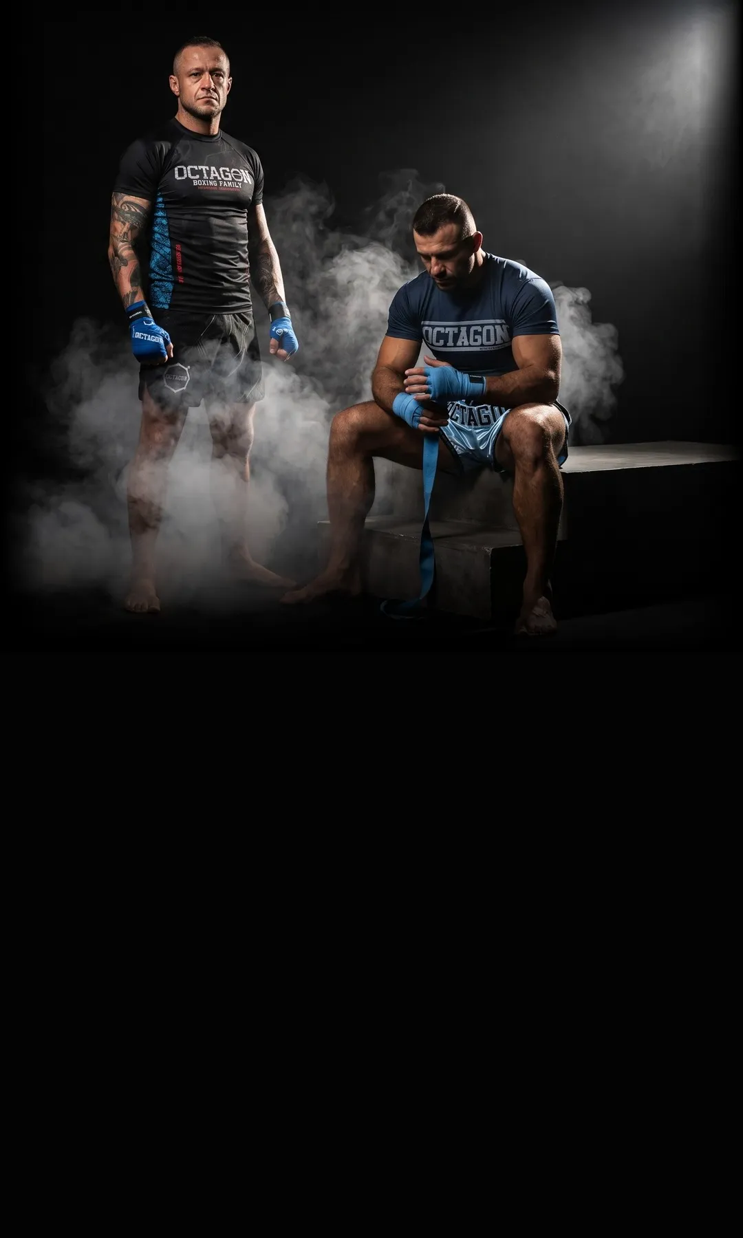 Fighters in Octagon rashguards and MMA shorts with boxing hand wraps